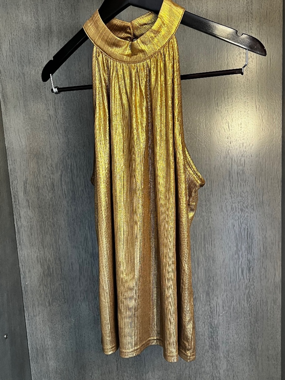 No listed brand gold sleeveless lame 2 button back top